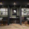 a lounge with seating and art on the wall